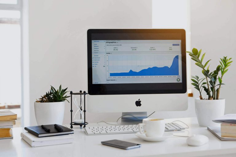computer monitor with a graph trending up