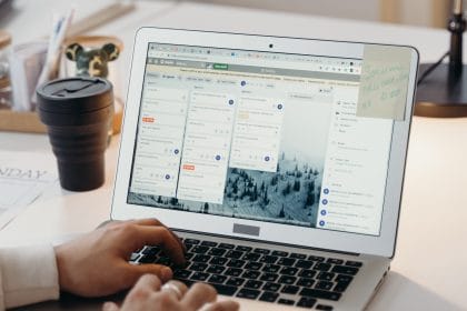 laptop with columns of text digital project management