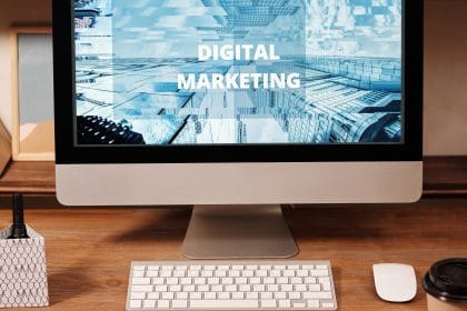 imac computer screen that says digital marketing