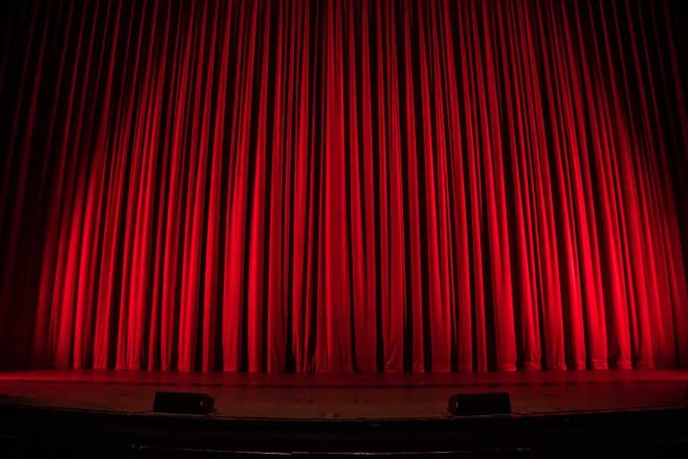 red curtains and a stage, going to be a show