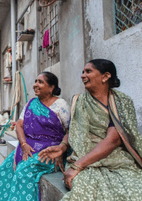 nonprofits two women in saris sitting